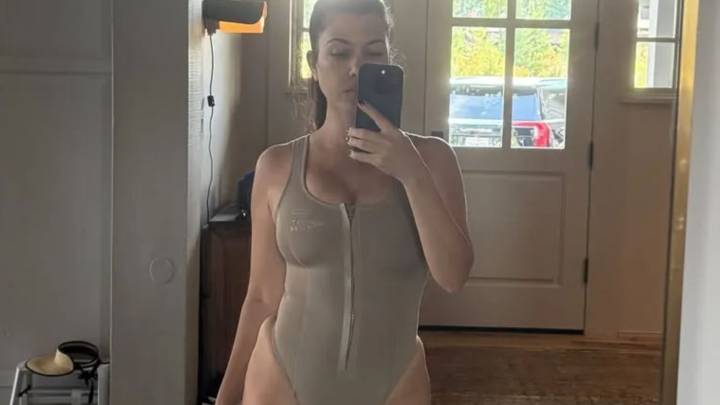 Kourtney Kardashian's fans gasp as she shares rare unfiltered snap in nude body suit and looks incredible