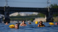 Seine River Greets Swimmers As Paris Stifles In Heat Wave