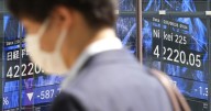 Asian shares decline following Wall Street's dip