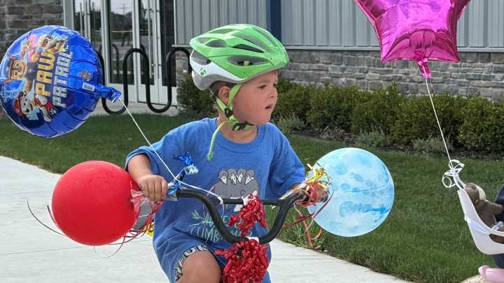 Kids celebrate start of new school year with bike parade