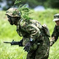 Pacifist Japan struggles to boost troops as China anxiety grows