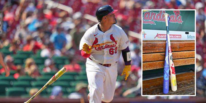 Yohel Pozo homers using bat painted with hospitalized children's handprints