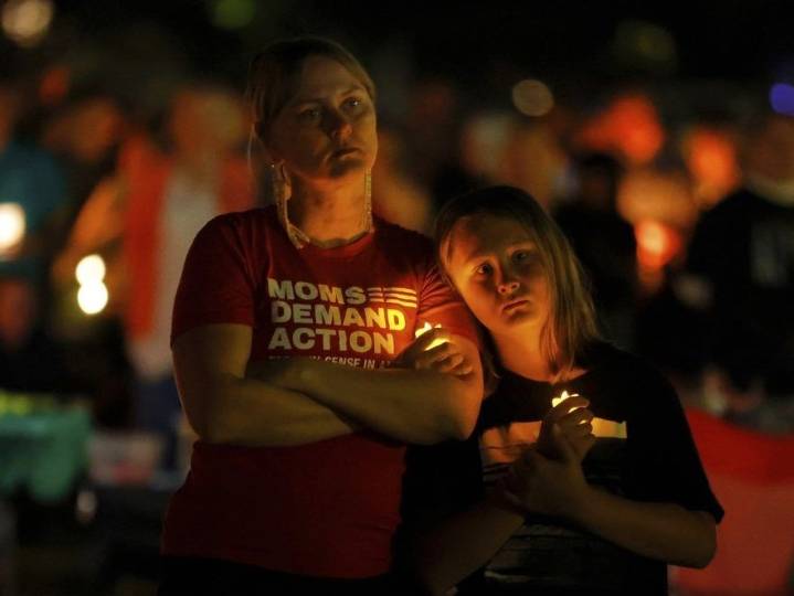 Hundreds honour 2 children killed, 17 people wounded in shooting