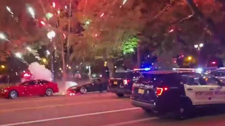 Crowd throws fireworks at Ore. police trying to break up street takeover