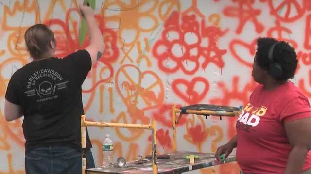 Group allowed to finish community mural after Manchester tells it to stop