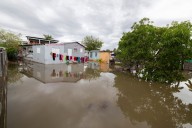 Hurricane Erin weakens to Category 3 as forecasters warn of storm's rapid growth