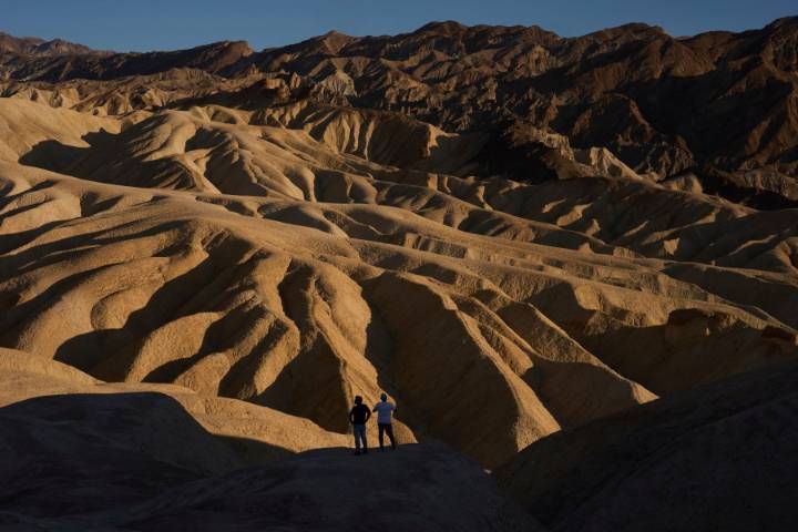 Searing heat draws visitors to California's Death Valley, where it's tough to communicate the risks