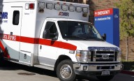 Burton house fire kills woman, injures man