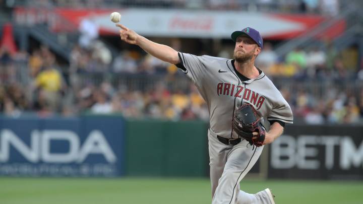 Rangers add veteran right-hander Merrill Kelly in a trade with the Diamondbacks