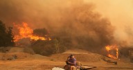 Thousands evacuate as wildfire rapidly spreads in southern California