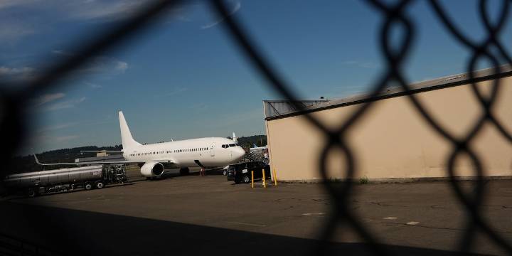 US deportation flights hit record highs as carriers try to hide the planes, advocates say