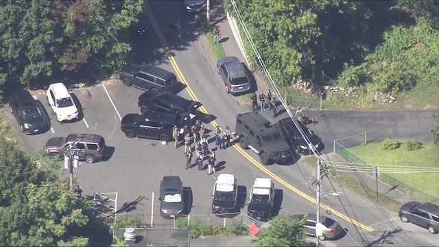 Residents asked to shelter in place as police search for armed suspect near Mass. pond