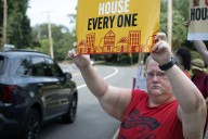 Protesters deliver letter to Hill’s door opposing cuts to federal programs