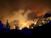 Growing wildfires in Oregon and California threaten homes, prompt evacuations