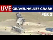 LIVE: Gravel hauler overturned in Detroit, spilling debris on I