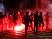 Protesters in northern Serbia target governing party’s HQ as clashes escalate
