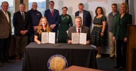 Dunleavy inks deal to speed up permitting in Alaska