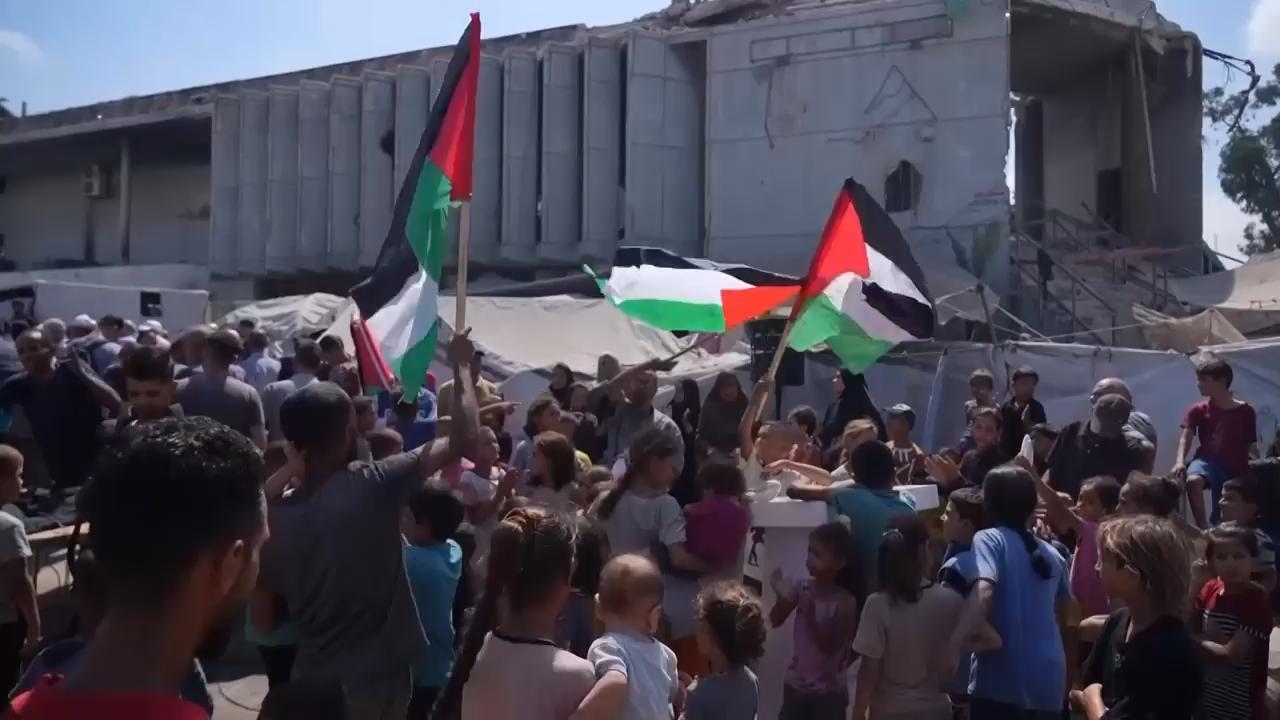 Palestinians in Gaza City protest against the war and forced migration
