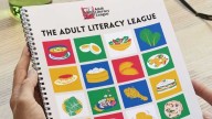 Adult Literacy League celebrating new cookbook with original recipes, office space