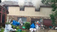 Monroe County battles house fire in Bolingbroke, struggling due to 'overwhelming collection of belongings'