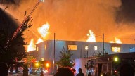 Crews fighting commercial fire near North Madelia and East Riverside Ave