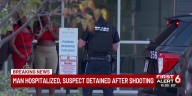 Man hospitalized, suspect detained after shooting