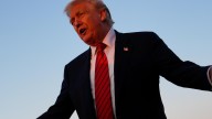 Trump’s new tariffs go into effect as US economy shows signs of strain