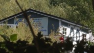 Charges filed against owners of New York boarding facility after 21 dogs found dead