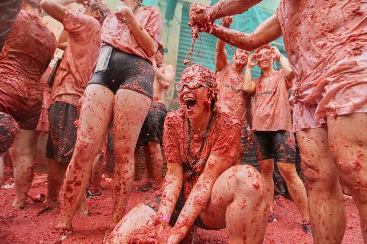 Thousands of people throw tomatoes in Spain’s ‘Tomatina,’ the mother of all food fights