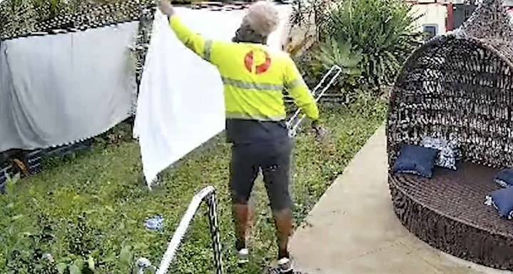 Postman’s Unusual Act of Kindness Makes Him a Rainy Day ‘Laundry Hero’