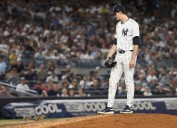 Yankees vs. Red Sox delayed by squirrel on field in bizarre scene