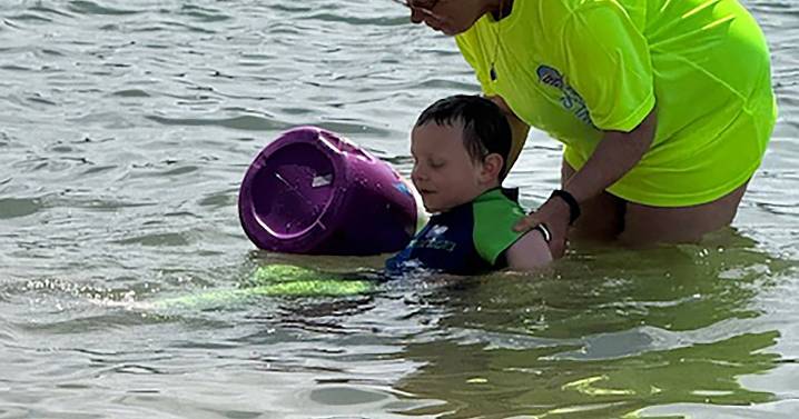 World record swim lesson comes to Dover City Beach