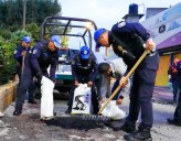 Policías de Gustavo A. Madero repararán baches en rondines nocturnos