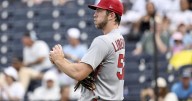 Cardinals author dull finish in loss after long rain delay
