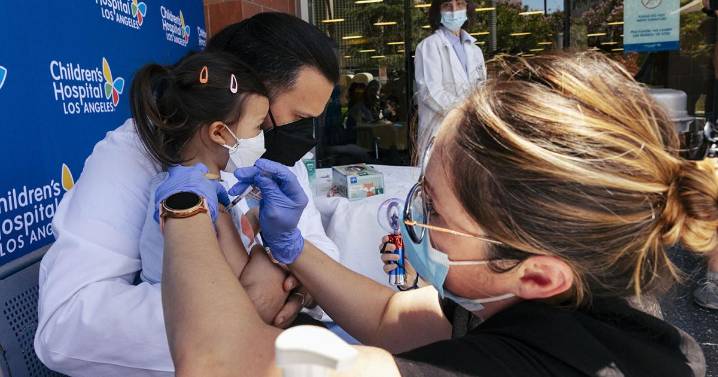 COVID shots for kids still recommended by US pediatric group in break with CDC