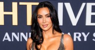 Kim Kardashian Modeled Her Face Wrap Wearing a Fur Coat