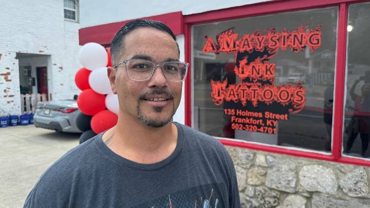 Recovery after flooding: A tattoo artist inks a new storefront