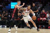 Sources: Bucks add free agent Amir Coffey on 1
