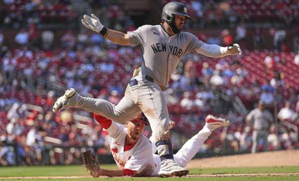 4-run 9th inning lets Yankees sweep Cardinals 8