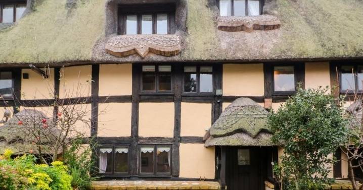 The 'fairy tale' Cotswold thatched cottage which has an 'upside down' surprise