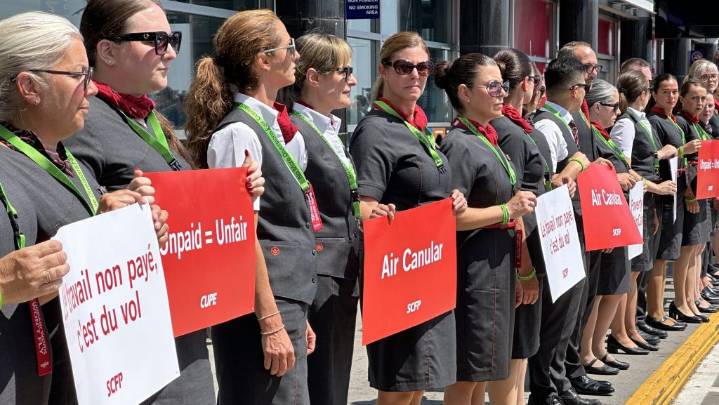Air Canada flight attendants hold silent protest outside Montreal