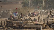 Israel says it struck militants posing as aid workers in Gaza