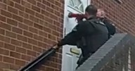 Knife and knuckleduster seized as police raid Stratford home