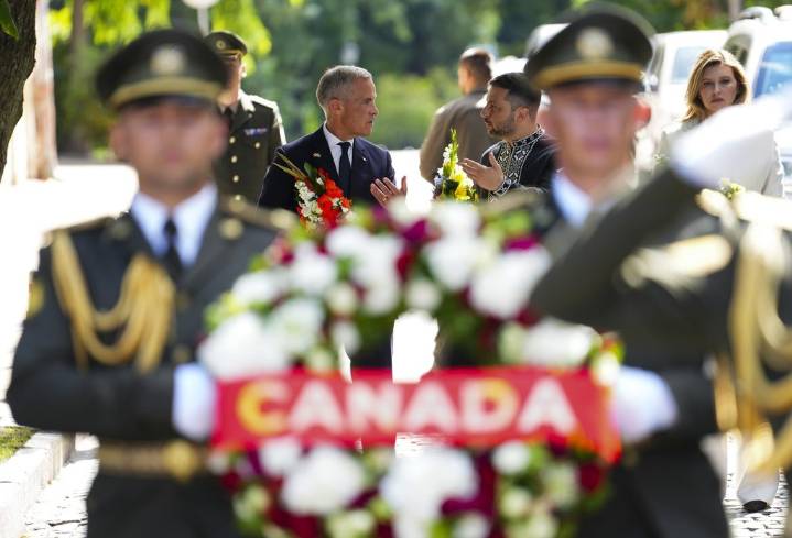 ‘Not a very funny place’: Canadians part of a growing makeshift memorial in Kyiv
