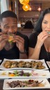 Food influencers narrowly escape death after car crashes into restaurant table mid