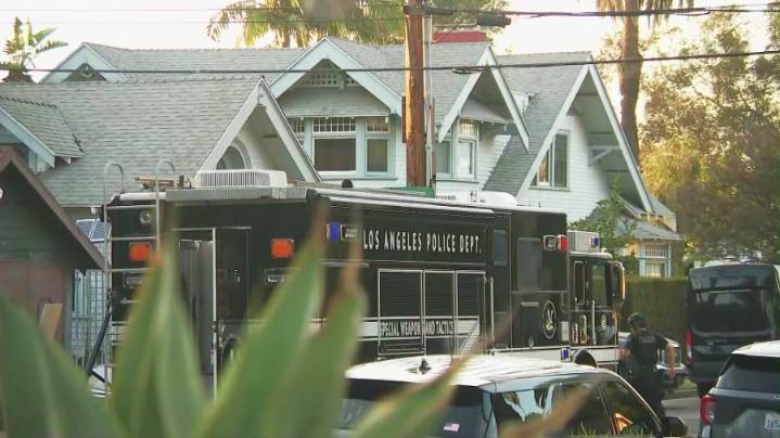 Man arrested after hours-long SWAT standoff, deadly shooting in South Los Angeles