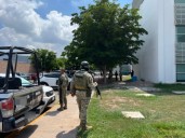 Balean a persona en el estacionamiento d…