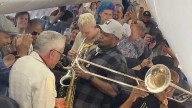 WATCH: Jazz saxophonist turns flight delay into viral jam session