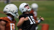 Texas QB Manning says NFL plans not taking shape yet despite grandpa's prediction of 2026 in Austin