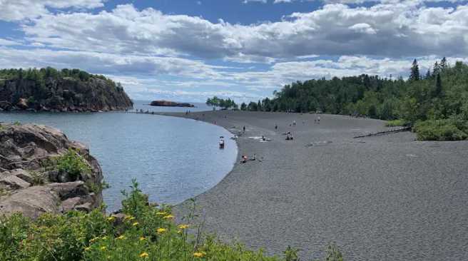 U.S. Coast Guard Uses Helicopter To Rescue Children Near Black Beach